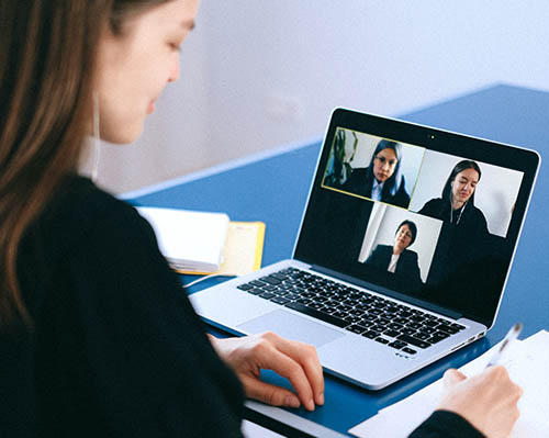 Salesperson on a Virtual Zoom meeting with Clients